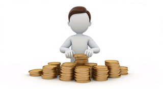 Man Stacking Coins