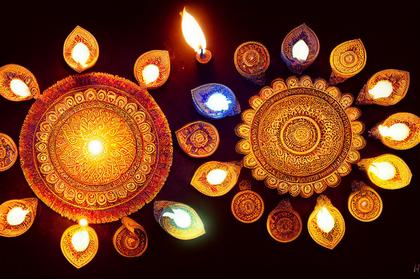 Diwali Background with Diya and Rangoli Design Image