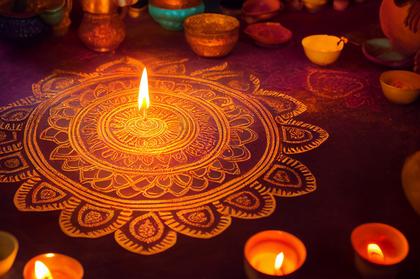 Diwali Diya Background with Rangoli Design