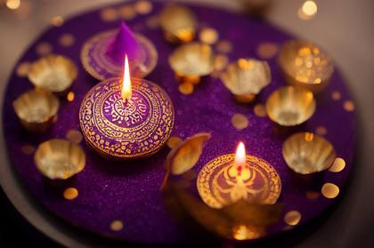 Happy Diwali Greeting Card with Gold Diya on Purple Background Image