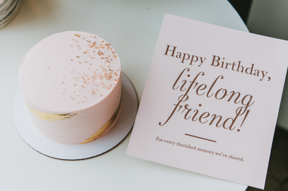 Pink Birthday Cake with Gold Accents and Happy Birthday Card