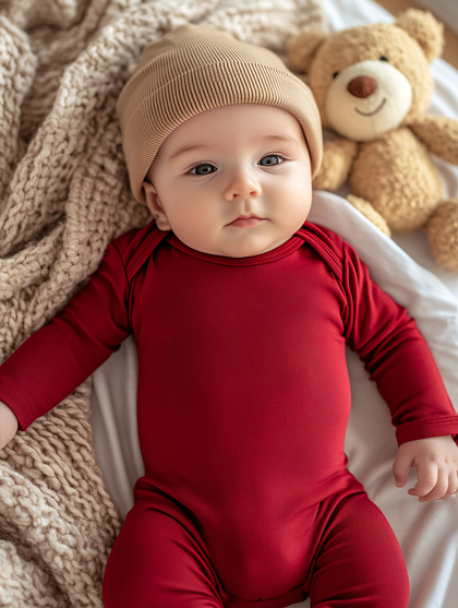 Adorable Baby In Red Onesie