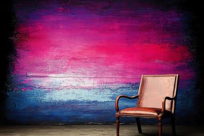 Antique Leather Armchair on Colorful Wall