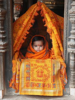 baby-in-orange-fabric