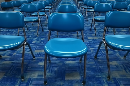 Blue Chairs in an Auditorium