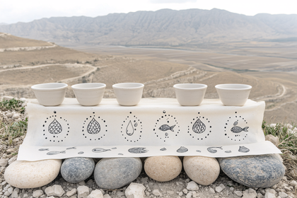 Bowls and Drawn Cloth Outdoors