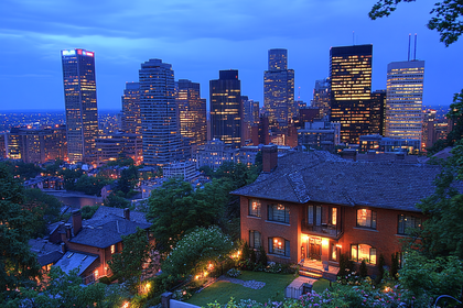 Cityscape at Dusk with Illuminated Buildings and Houses
