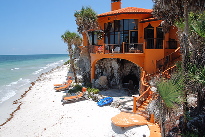 Coastal Orange House On Cliff