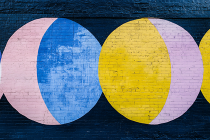 Colorful Circles Mural On Brick Wall