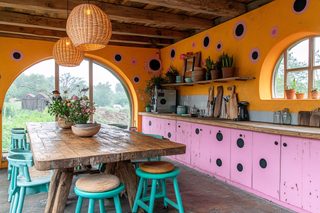 Colorful Farmhouse Kitchen With Arch Window