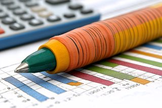 Colorful Pen On Financial Charts