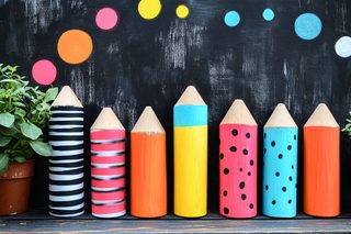 Colorful Wooden Pencils on Blackboard