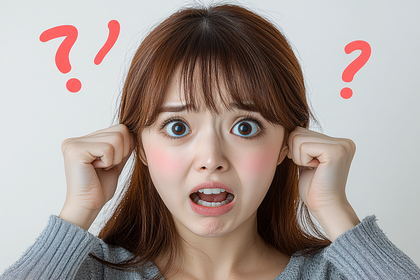 Confused Young Woman with Question Marks