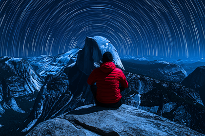 Contemplation Under Star Trails