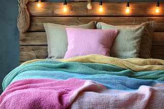 Cozy Bed with Colorful Blankets