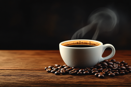 Cup Of Steaming Coffee With Coffee Beans