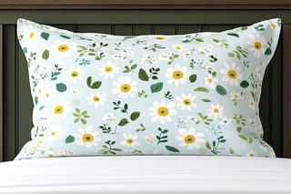 Daisy Floral Pillow On Bed