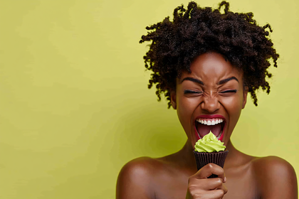 Ecstatic Woman About to Eat Cupcake