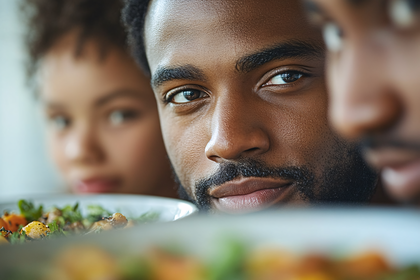 Focused Gaze At Family Dinner