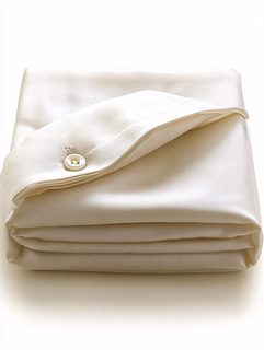 Folded White Bedding with Button Detail
