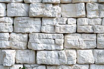 Graffiti Art On White Brick Wall