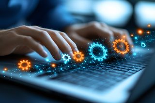 Hands on Laptop with Digital Gears