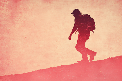Hiking Silhouette on Hill