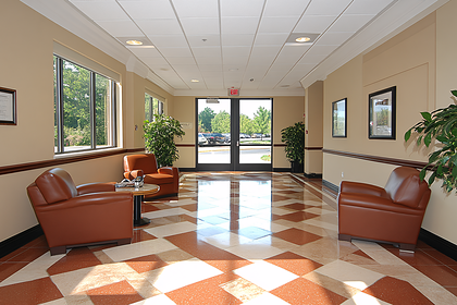 Lobby Waiting Area with Armchairs and Plants