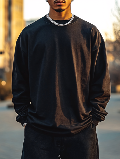 Man Wearing Black Sweatshirt And Silver Chain
