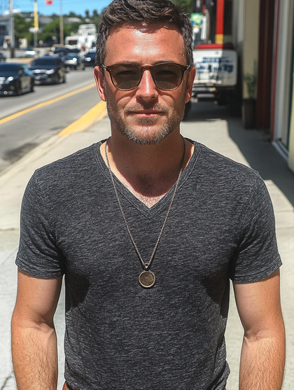 Man Wearing Sunglasses and Necklace