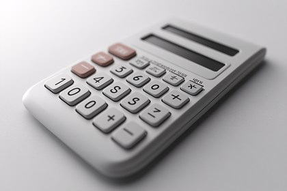 Minimalist Calculator on White Surface