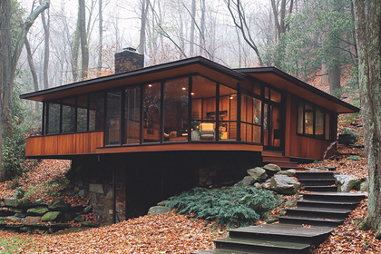 Modern Wood And Glass House In Autumn Woods