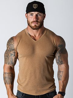 Muscular Man with Tattoos and Beanie