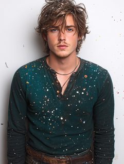 Portrait Of A Young Man Covered In Paint Splatters