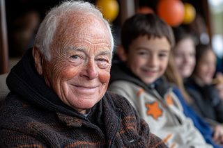 Portrait of Smiling Senior Man with Children