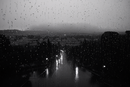 Rain-Streaked City View