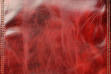 Reddish Brown Leather Texture With Stitching Detail