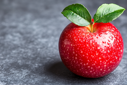 Ripe Red Apple with Green Leaves