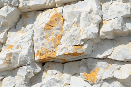 Rough White Rocks with Yellow Mineral Deposits