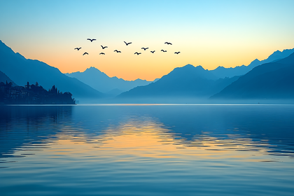 Serene Lake Sunset with Mountain Silhouette