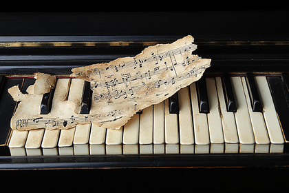 Sheet Music on Piano Keys