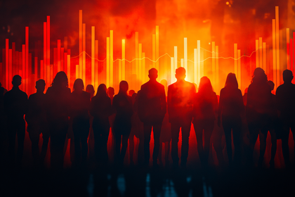 Silhouetted Crowd Against Financial Graph