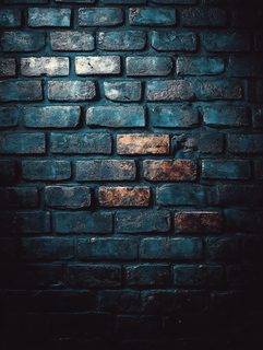 Textured Brick Wall With Moody Lighting