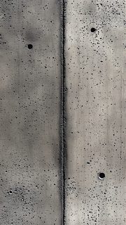 Textured Concrete Surface with Vertical Seam