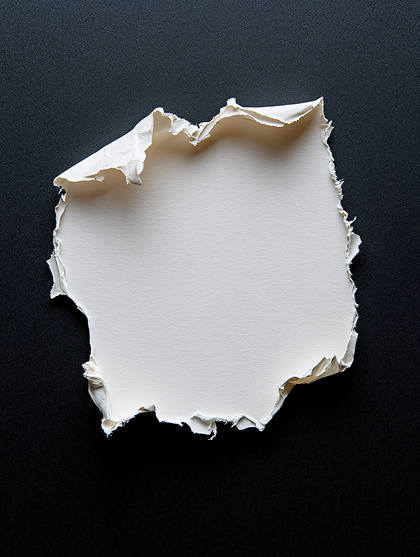 Torn Paper on Black Background