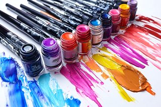Vibrant Paintbrushes and Colorful Paints