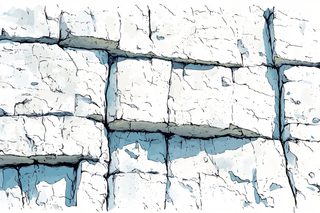 White Stone Wall with Cracks