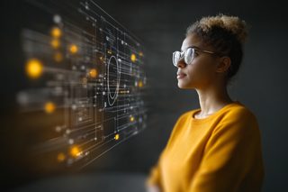 Woman Analyzing Futuristic Technology Interface