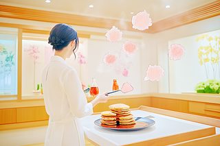 Woman Cooking Pancakes